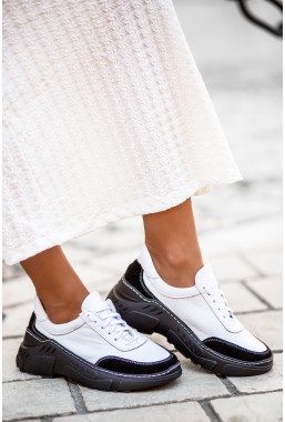 Biało-czarne sneakersy Arista